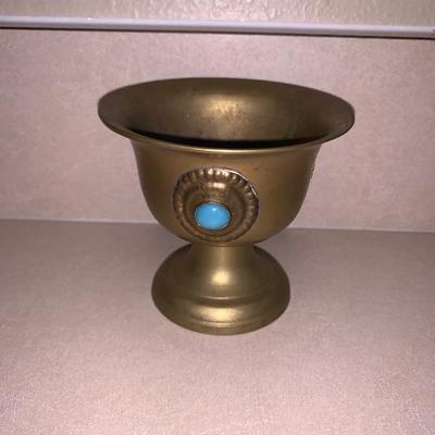 Small brass cup with three gems