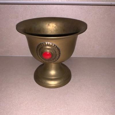Small brass cup with three gems