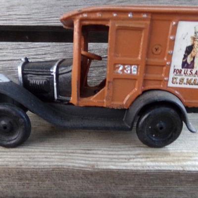 LOT 301  CAST IRON DOUBLE DECKER & UNCLE SAM VAN