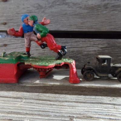 LOT 302  CAST IRON COIN BANK & TRUCK