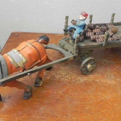 LOT 306  CAST IRON HORSE DRAWN WAGON