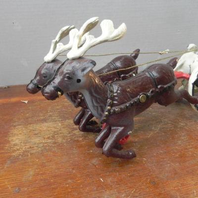 LOT 307  CAST SANTA IN SLEIGH WITH REINDEER