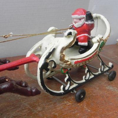LOT 307  CAST SANTA IN SLEIGH WITH REINDEER