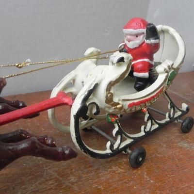 LOT 307  CAST SANTA IN SLEIGH WITH REINDEER