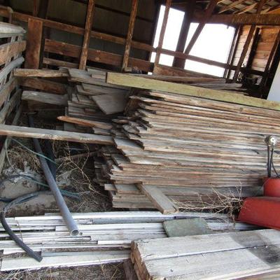 BB-53  LARGE PILES OF WOOD PLANKS