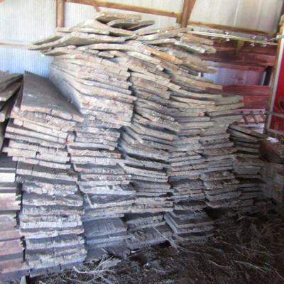 BB-53  LARGE PILES OF WOOD PLANKS