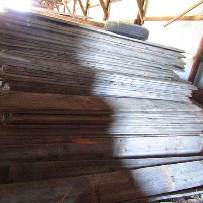 BB-53  LARGE PILES OF WOOD PLANKS