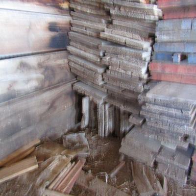 BB-53  LARGE PILES OF WOOD PLANKS