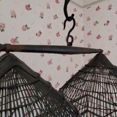 Very unique double dome iron woven bird cage with hand forged chain