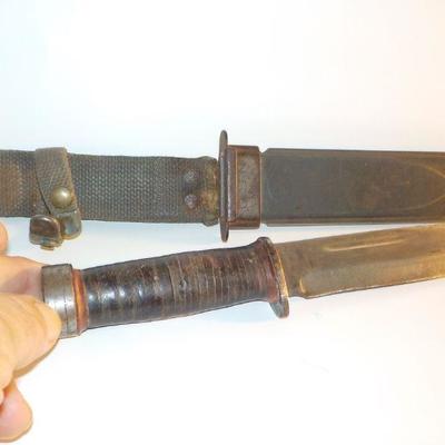 " USN pilot WW2 M2 fighting Bowie Knife". "The Famous Cattaraugus Fighting Knife".