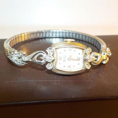 " Vintage Ladies High Fashion 10kt. Diamond wrist watch".