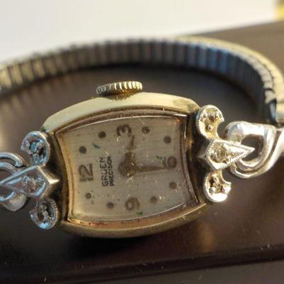 " Vintage Ladies High Fashion 10kt. Diamond wrist watch".