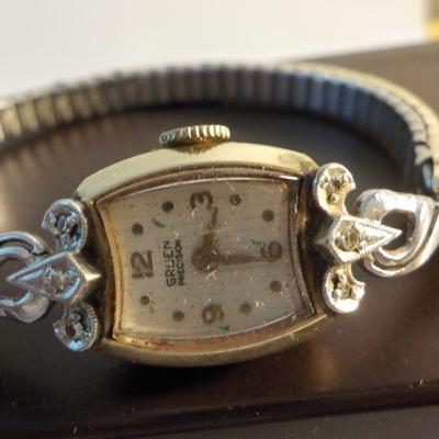 " Vintage Ladies High Fashion 10kt. Diamond wrist watch".