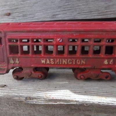 LOT 326  CAST IRON TROLLEY CARS