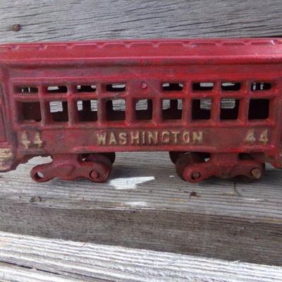 LOT 326  CAST IRON TROLLEY CARS
