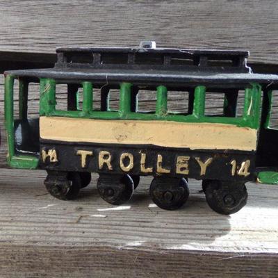 LOT 326  CAST IRON TROLLEY CARS