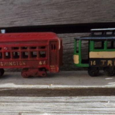 LOT 326  CAST IRON TROLLEY CARS