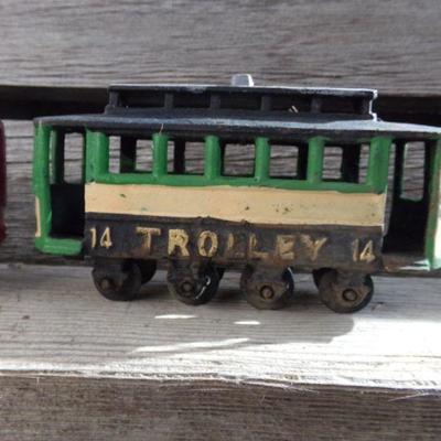 LOT 326  CAST IRON TROLLEY CARS