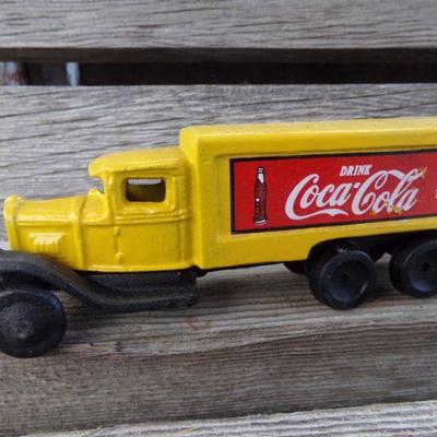 LOT 332  CAST IRON HORSE DRAWN BUGGY AND COKE TRUCK