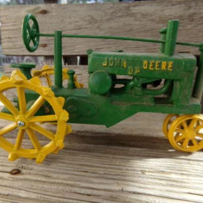 LOT 334  CAST IRON JOHN DEERE TRACTOR TOY
