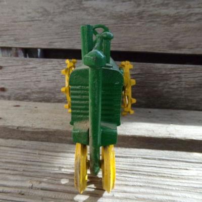 LOT 334  CAST IRON JOHN DEERE TRACTOR TOY
