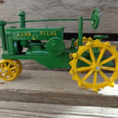 LOT 334  CAST IRON JOHN DEERE TRACTOR TOY