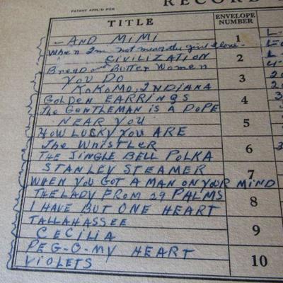 G-4   VINYL RECORD ALBUMS AND STAND