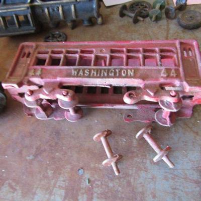 G-14  THREE CAST IRON TROLLEY CARS