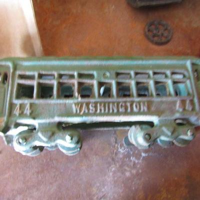 G-14  THREE CAST IRON TROLLEY CARS