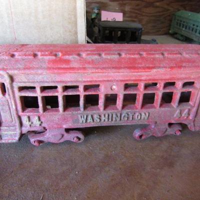 G-14  THREE CAST IRON TROLLEY CARS