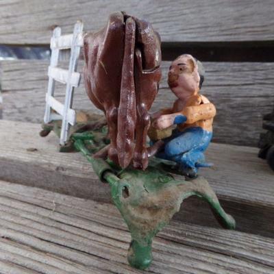 LOT 261  CAST IRON COIN BANK & CAR