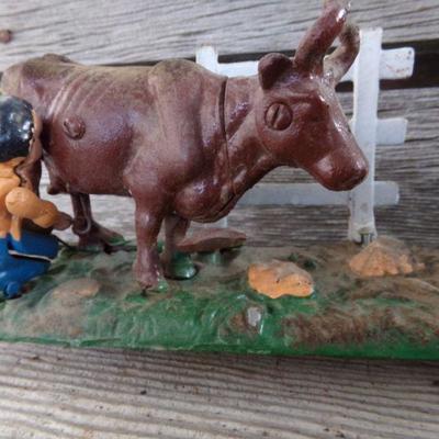 LOT 261  CAST IRON COIN BANK & CAR