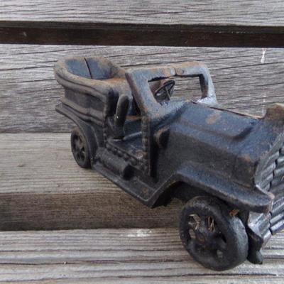LOT 261  CAST IRON COIN BANK & CAR