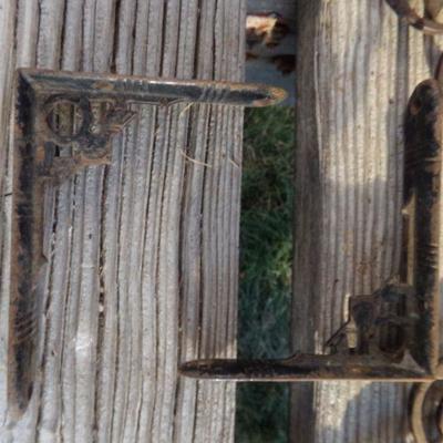 LOT 269   IRON BRACES AND CAST MATCH HOLDER