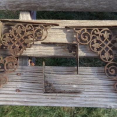 LOT 269   IRON BRACES AND CAST MATCH HOLDER