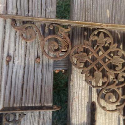 LOT 269   IRON BRACES AND CAST MATCH HOLDER