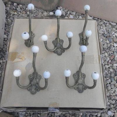 LOT 276  DECORATIVE COAT HOOKS