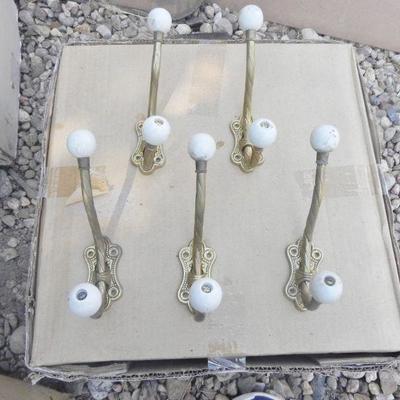 LOT 276  DECORATIVE COAT HOOKS