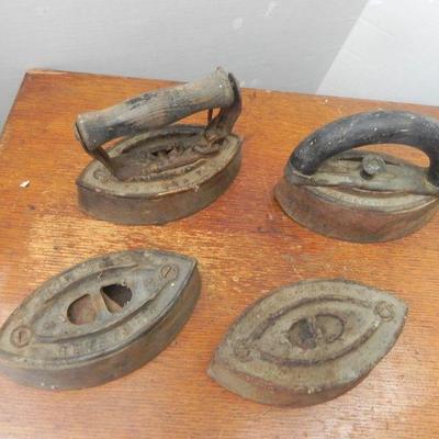 LOT 288  FOUR VINTAGE CLOTHES IRONS
