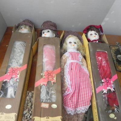 LOT 286  FOUR PORCELAIN DOLLS