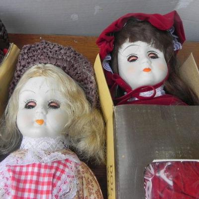 LOT 286  FOUR PORCELAIN DOLLS