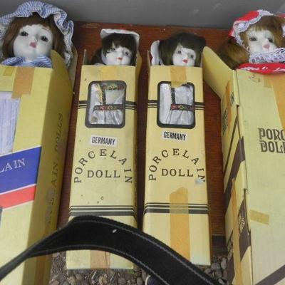 LOT 285  FOUR PORCELAIN DOLLS MARKED GERMANY
