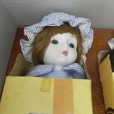 LOT 285  FOUR PORCELAIN DOLLS MARKED GERMANY