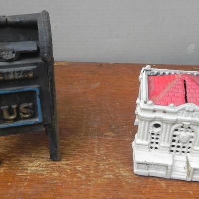 LOT 284  TWO CAST IRON COIN BANKS