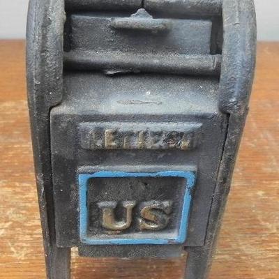 LOT 284  TWO CAST IRON COIN BANKS