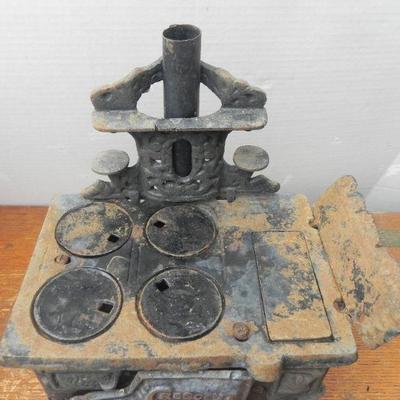 LOT 281  CRESCENT CAST IRON TOY STOVE