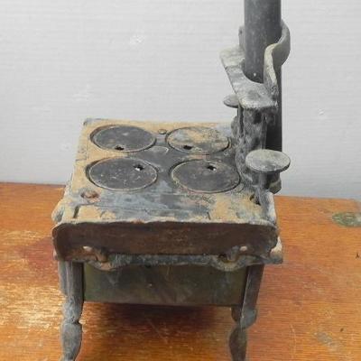 LOT 281  CRESCENT CAST IRON TOY STOVE
