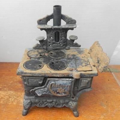 LOT 281  CRESCENT CAST IRON TOY STOVE