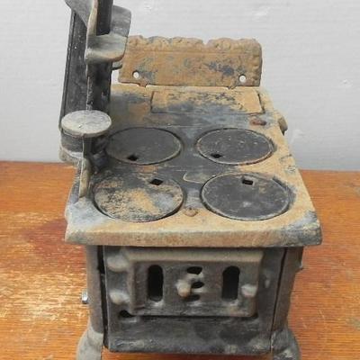 LOT 281  CRESCENT CAST IRON TOY STOVE