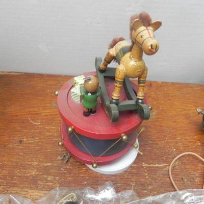 LOT 251  PUPPETS, MUSIC BOX AND BEAR RIDING A TRICYCLE